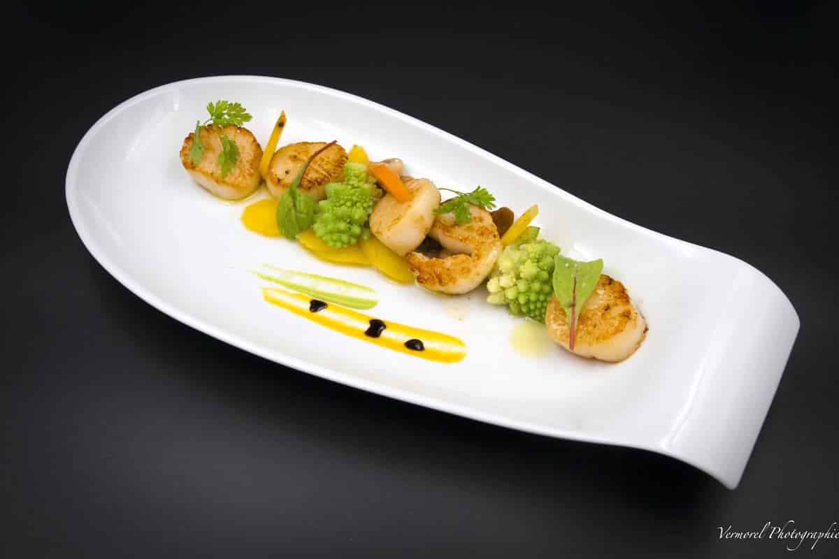 Scallops with passion vinaigrette and romanesco cauliflower